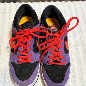 Nike Purple and Black Sneakers with Red Accents